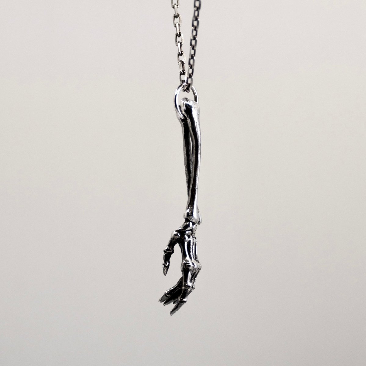 Silver Skeleton Arm pendant - general view on white background