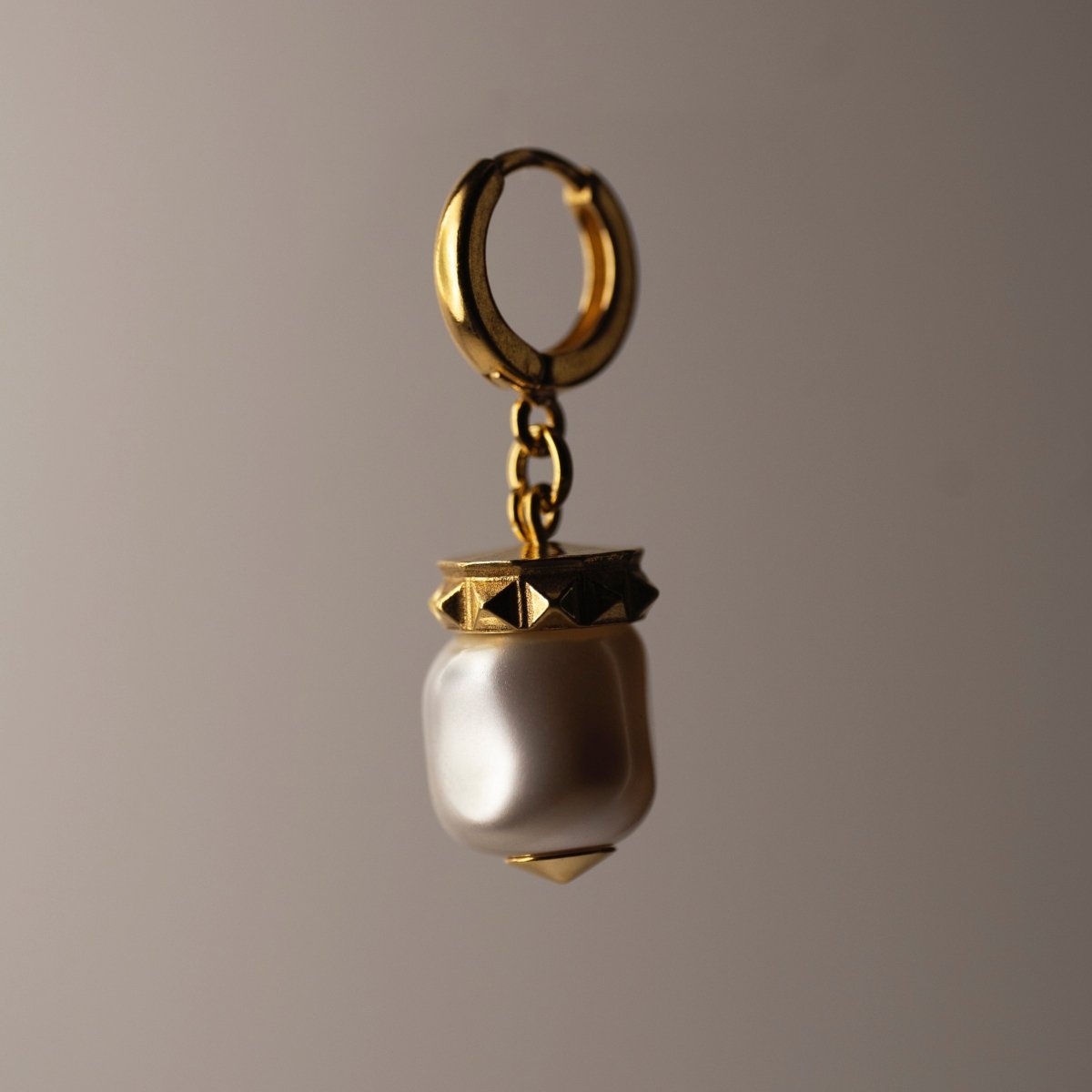 Baroque pearl earring by Macabre Gadgets - large pearl earring with gold-plated silver studs details on a huggie clasp