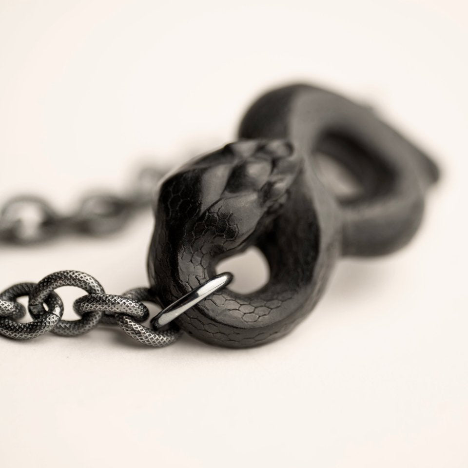 Black Snake bracelet - close up on a snake's head
