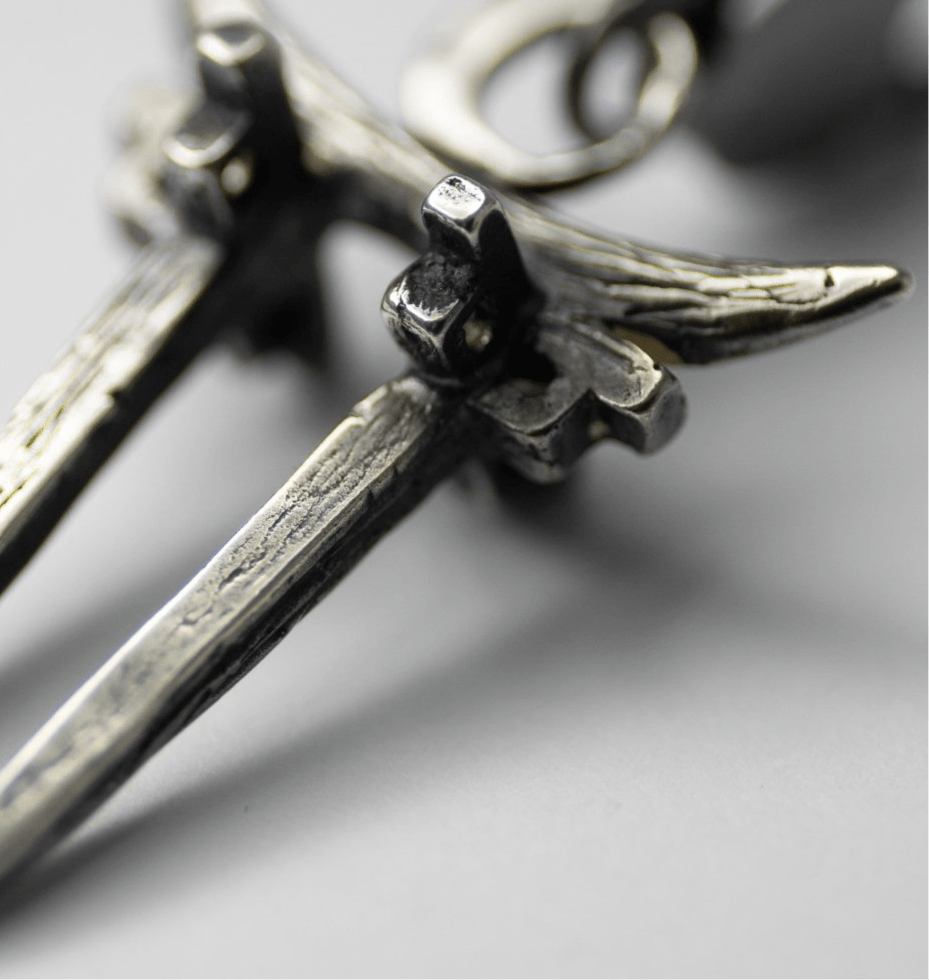 Moonglade Gate pendant - close-up of textured sterling silver gate charm
