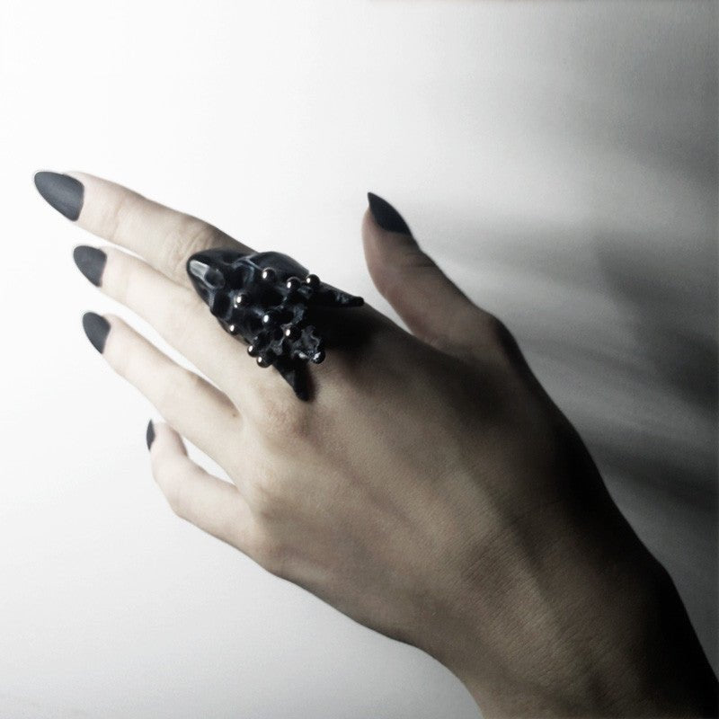 Female model wearing Pearl Crown Skull Ring - skull ring styling shot