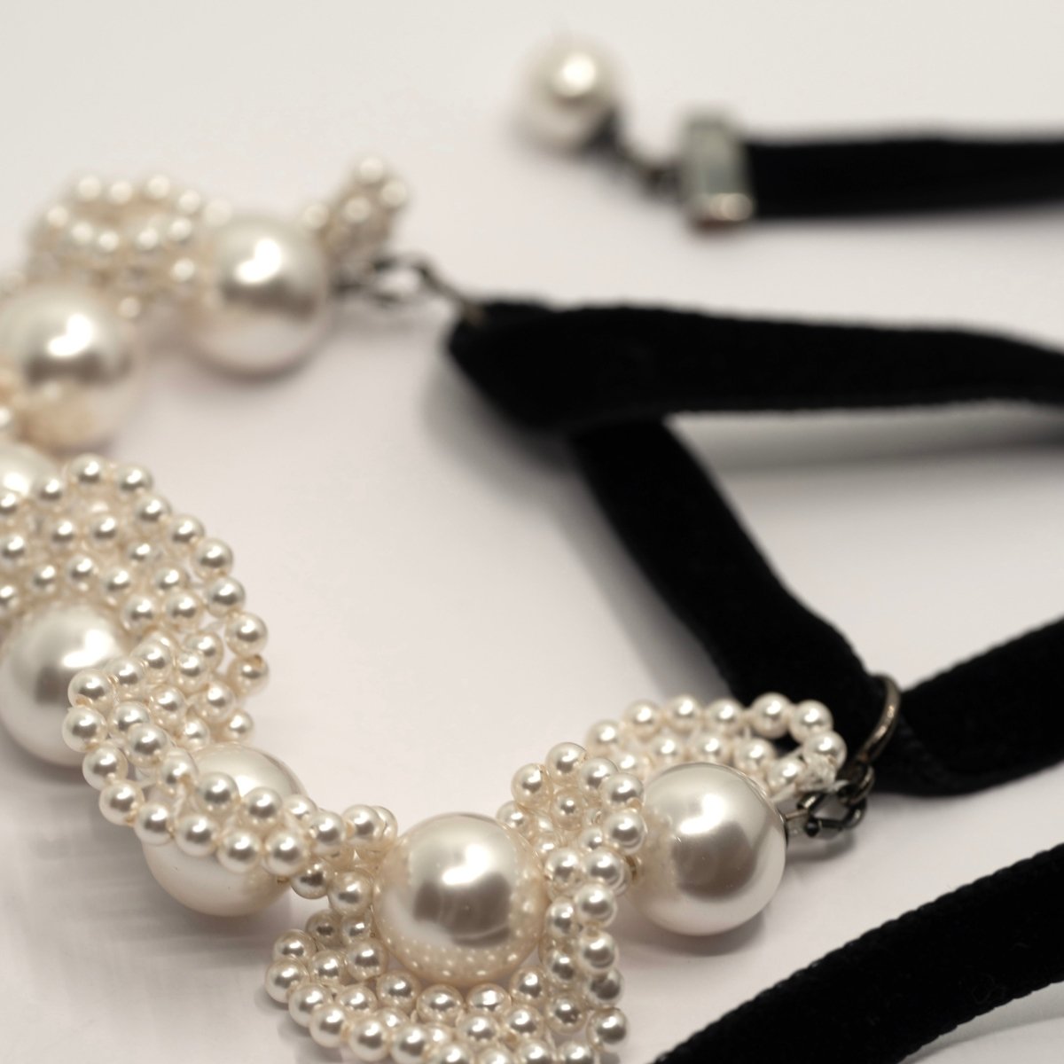 Pearl Lace bracelet - placed on a white surface