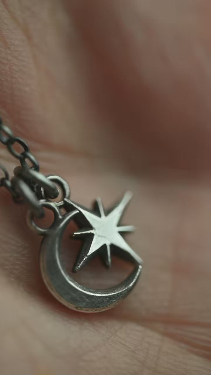 Selene Moon pendant and Asteria Silver Star pendant featured in a short video editorial