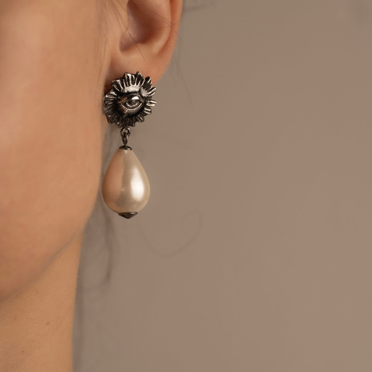 Sirius Pearl Drop earring by Macabre Gadgets on female model, close-up on ear to show fit and dimensions