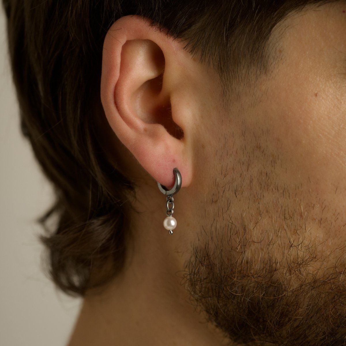 Mini Pearl earring - on a male bearded model