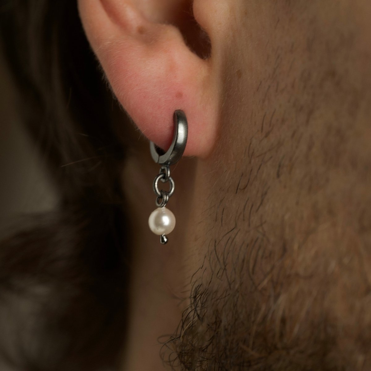 Mini Pearl earring - close up on  male model