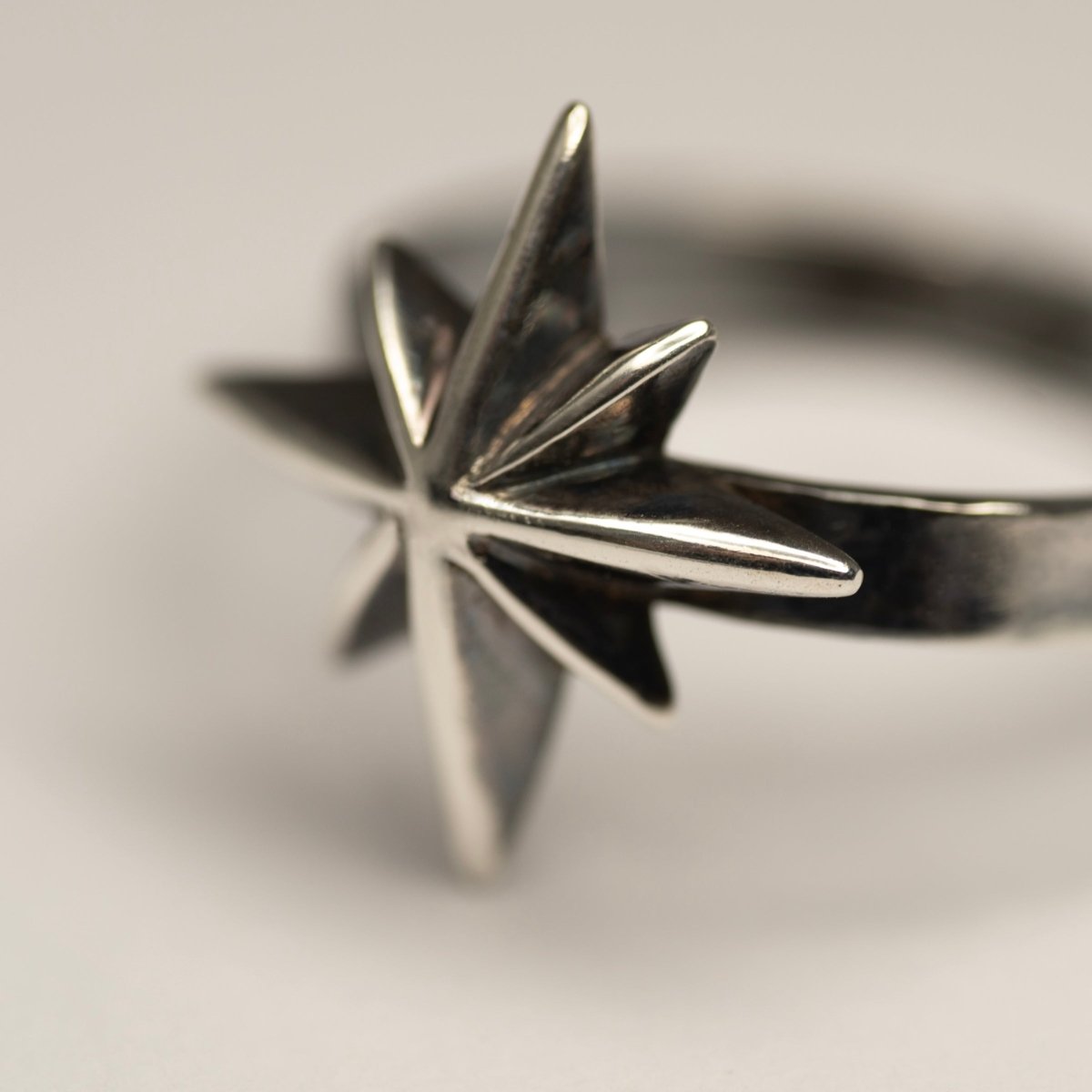 Star ring - close up, focus on polished surface of the ring