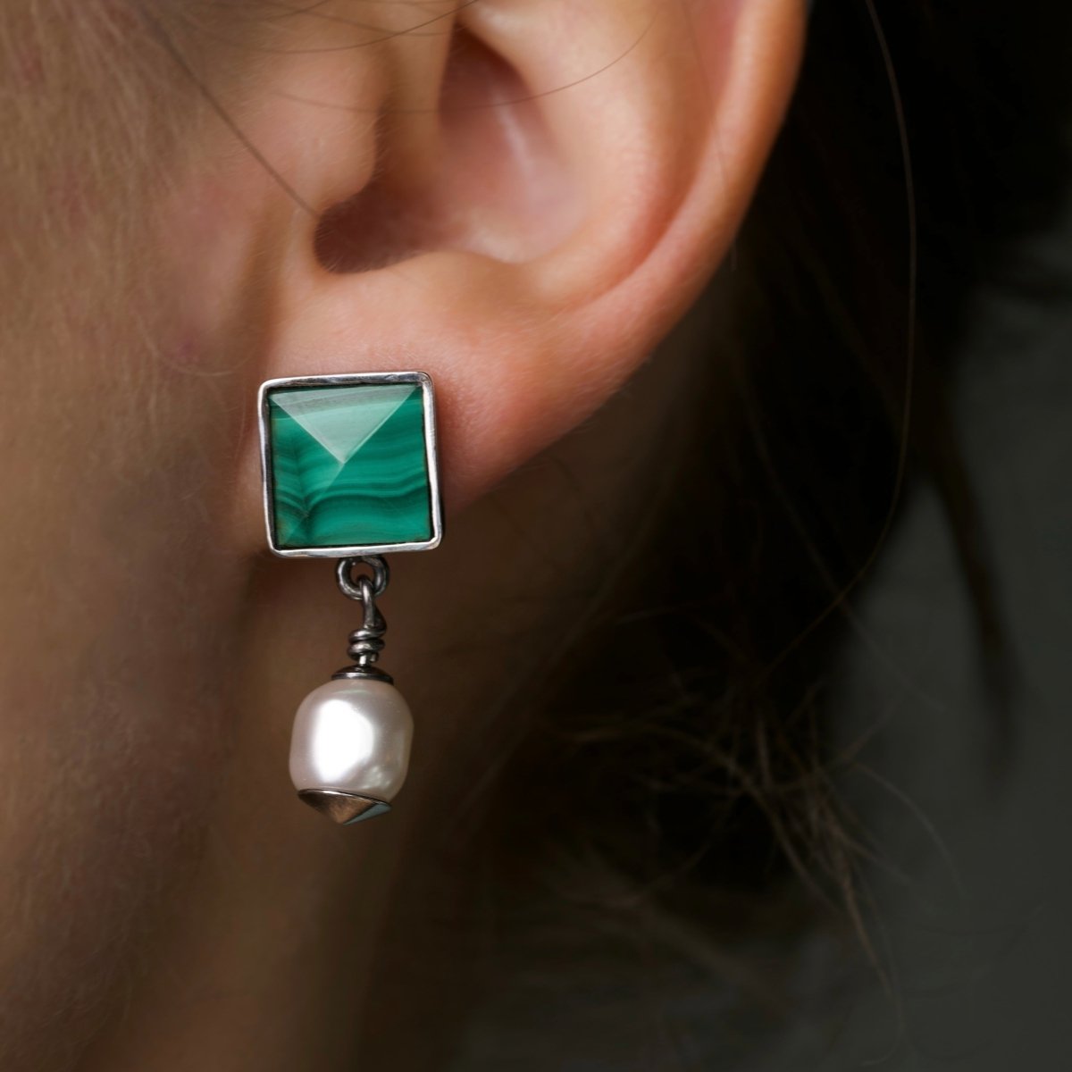 Female model wearing Malachite Studs earrings - natural green stone stud earrings - lifestyle shot, close-up