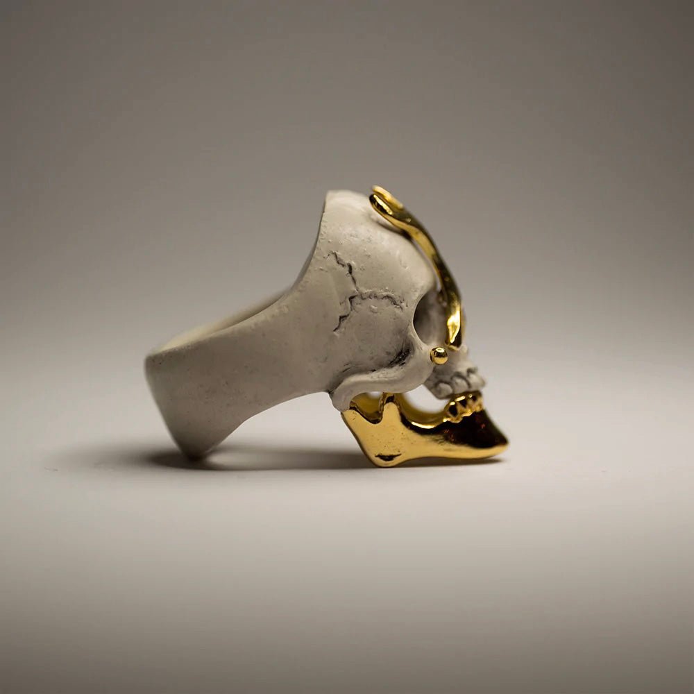 Ancient skull ring - gold variant - side view, clean product picture