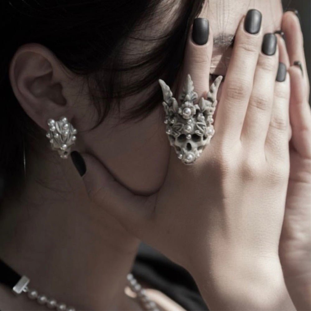 Female model wearing Coral Crown Skull ring - gothic skull ring styling shot