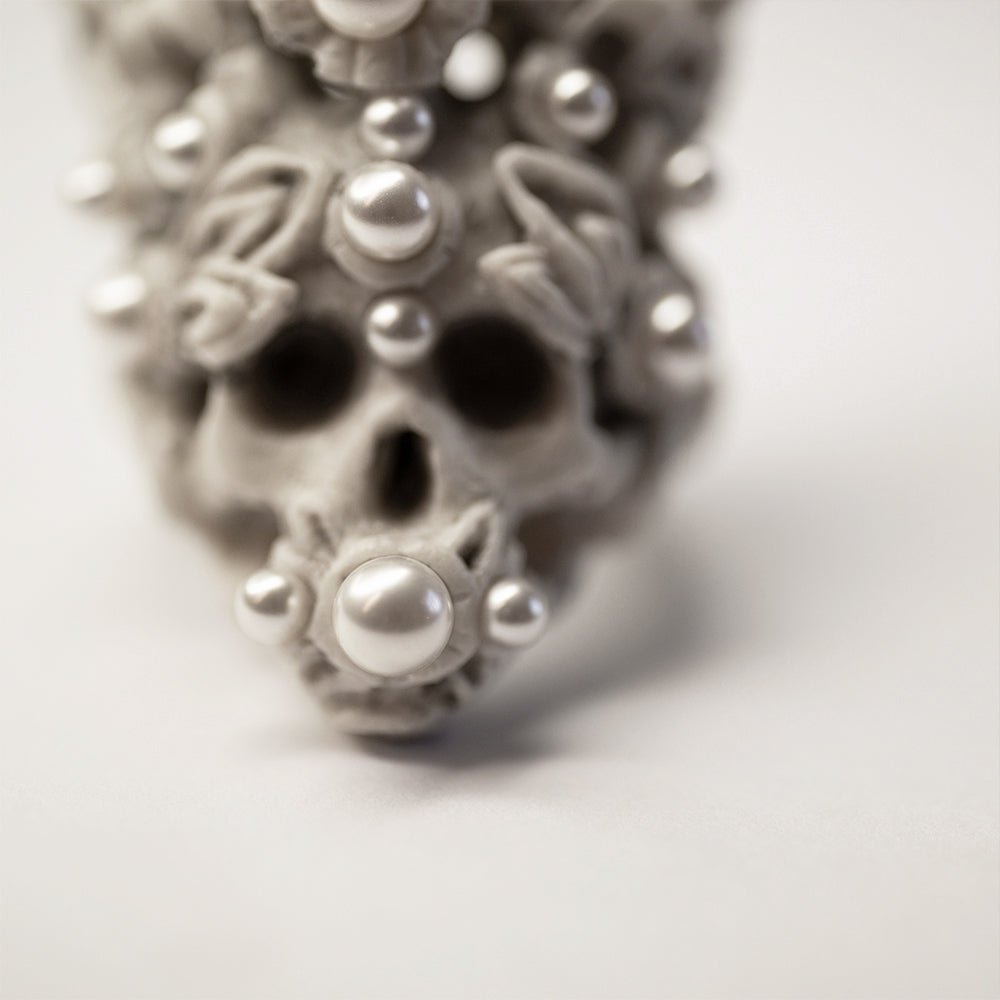 Close-up of Coral Crown Skull ring - focus on the skull detail covered with pearls