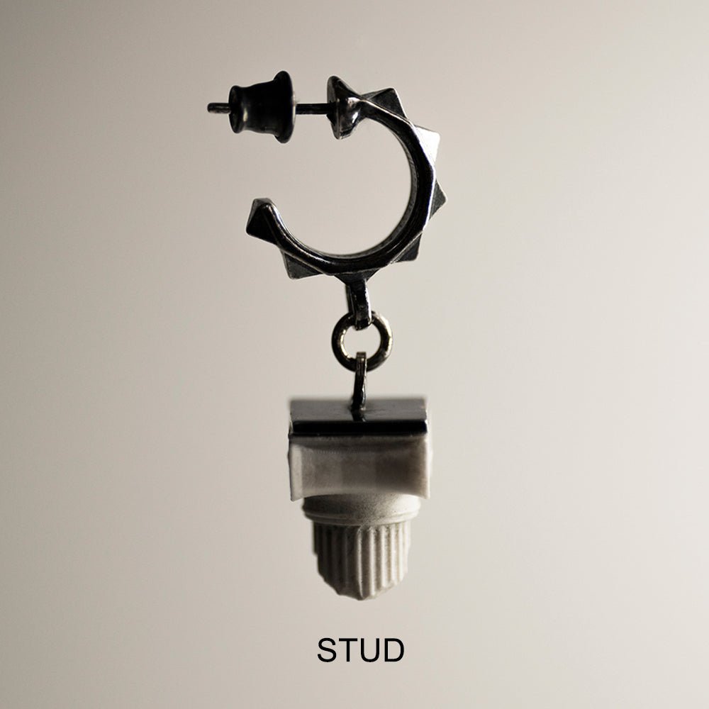 Ionic earring demonstrating a stud lock option on a neutral background
