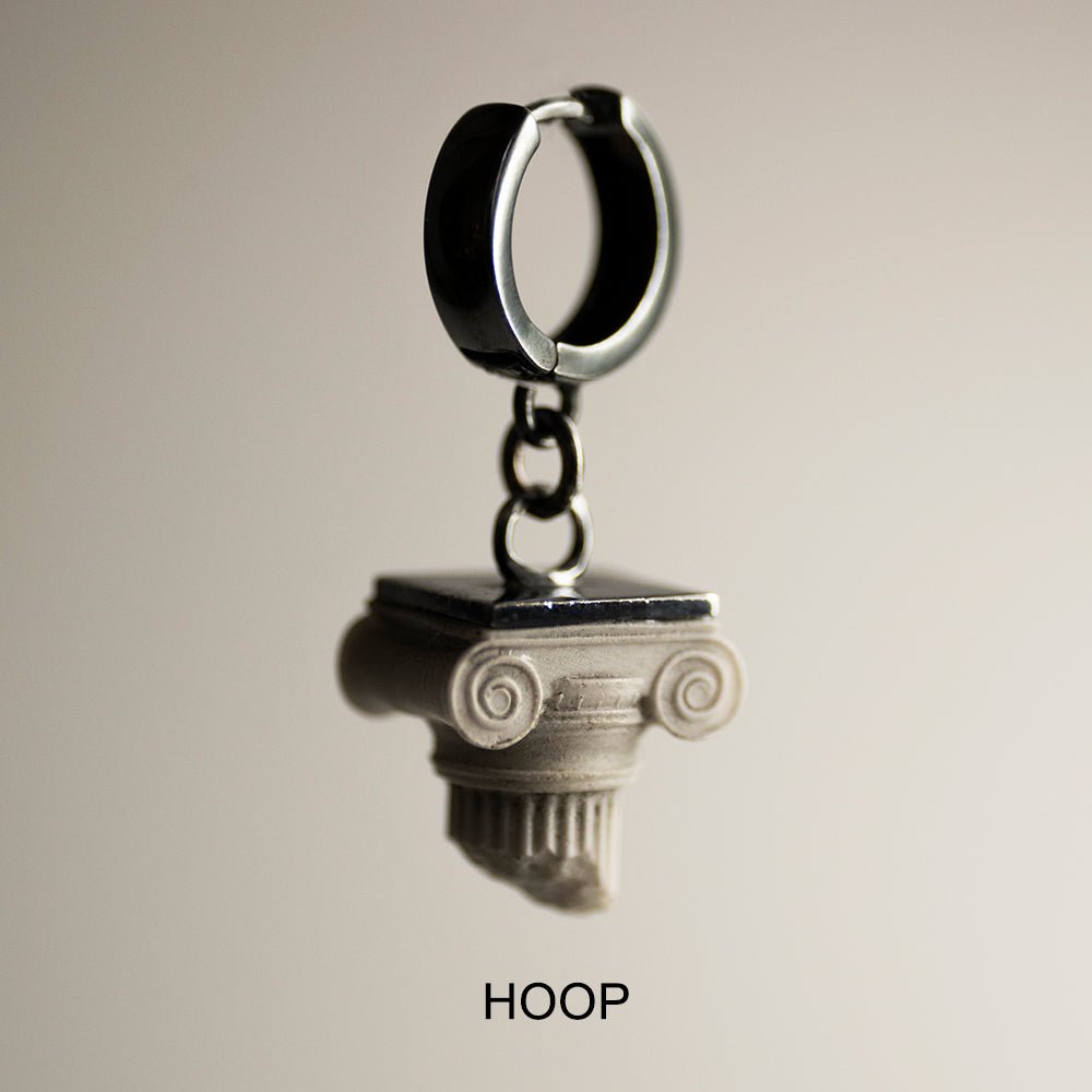 Ionic earring demonstrating a hoop lock option on a neutral background