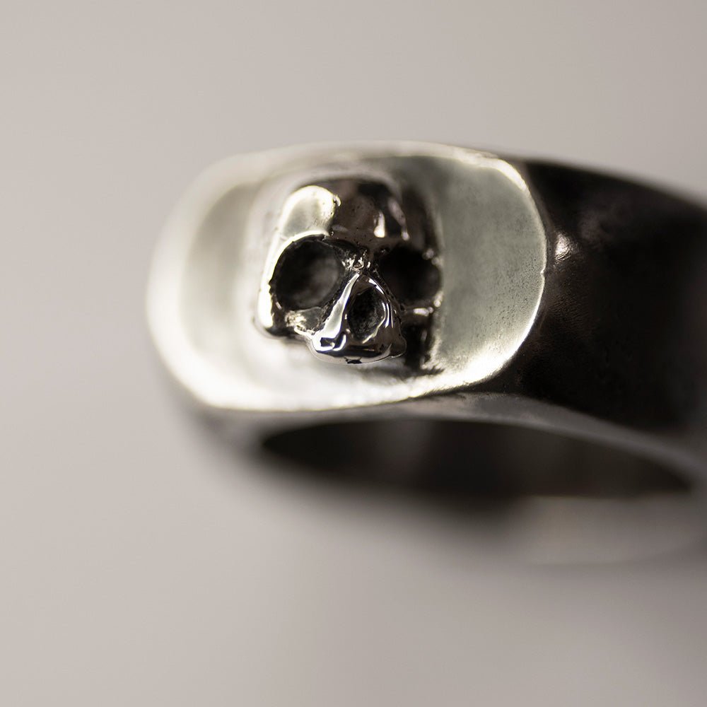 Flow ring - close up of the skull detail on sterling silver signet ring