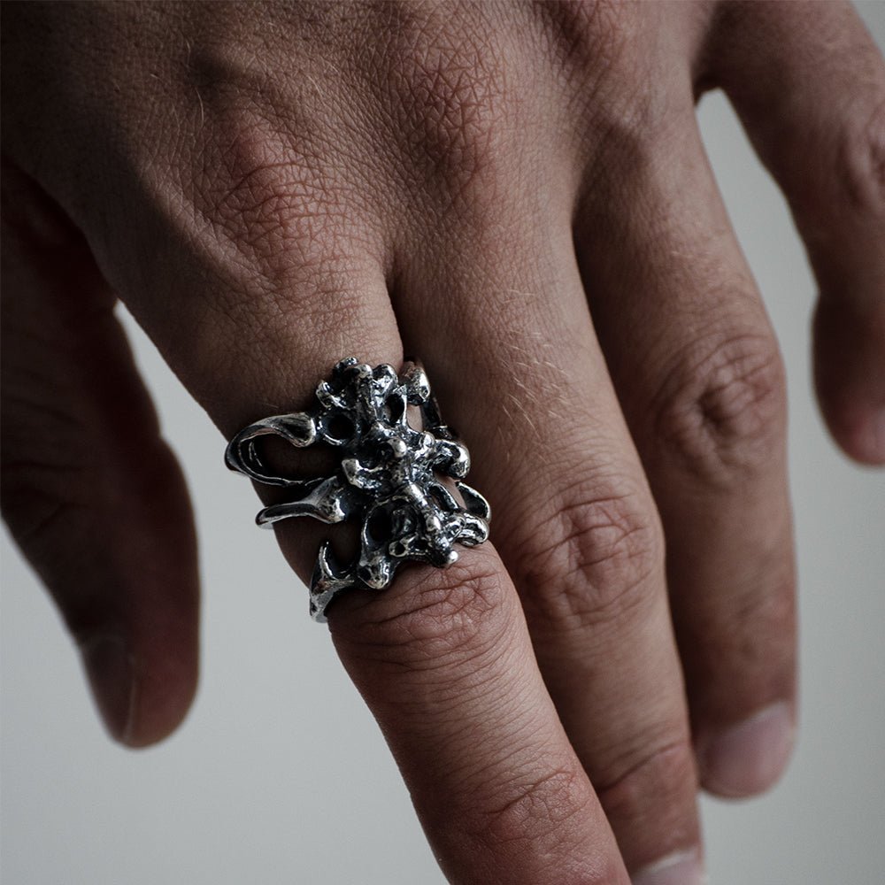 Male model wearing Gills Ribs ring - gothic silver ring styling shot