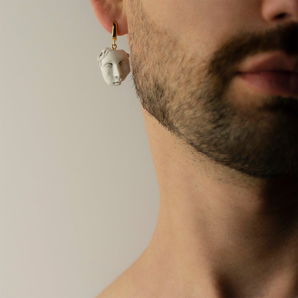 Helen earring - on a male model, to demonstrate size and fit, sculptured earring styling shot