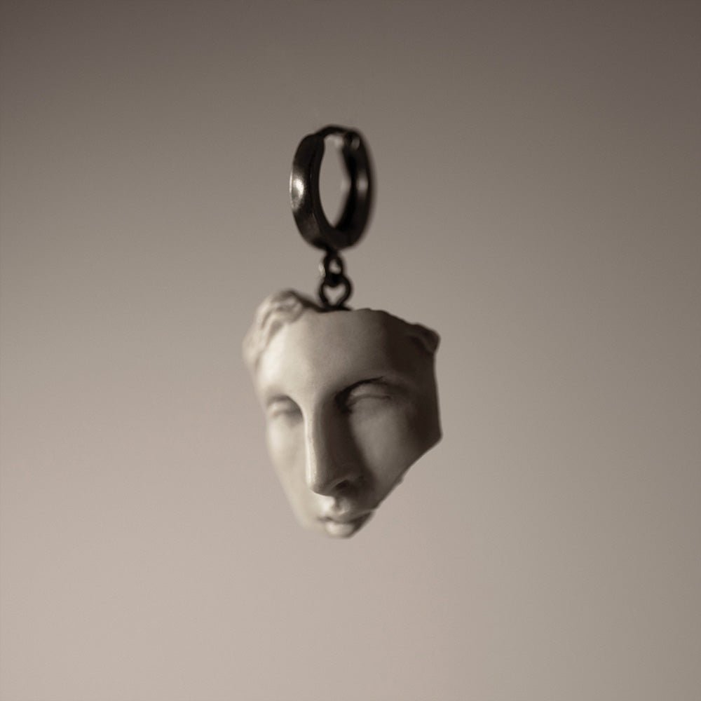 Helen earring - marble sculpted earring with sterling silver hoop clasp on a white background