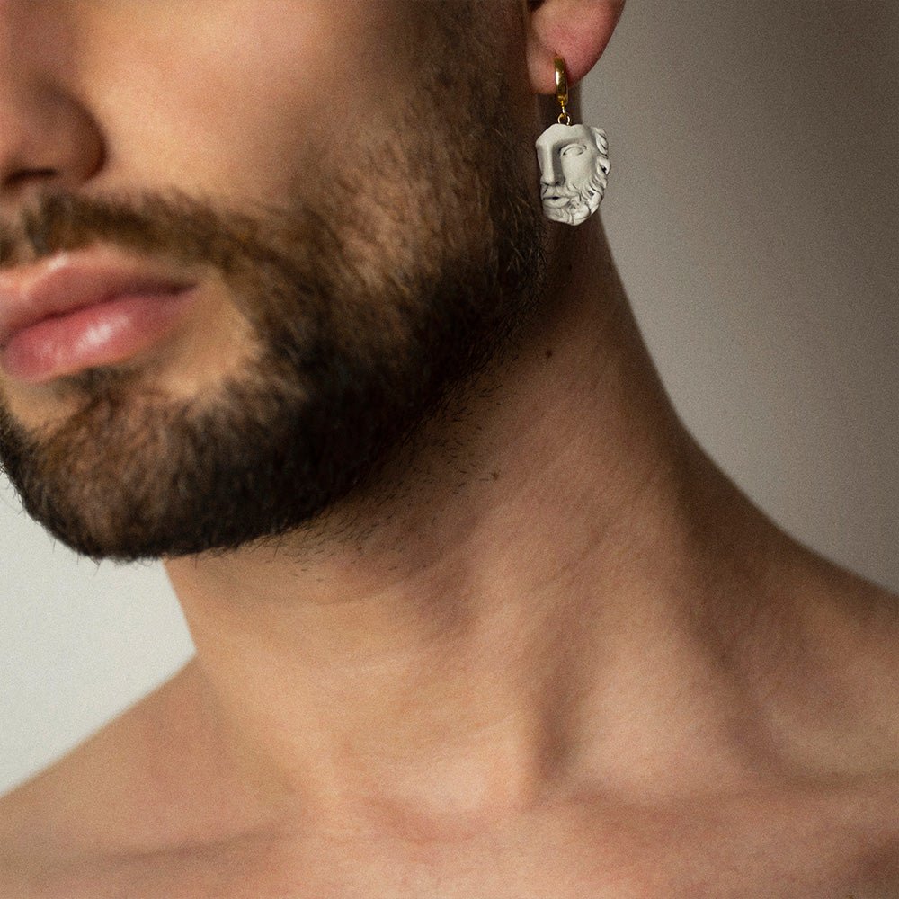 Male bearded model wearing Heracles earring, Greek mythology sculptural jewelry lifestyle photography