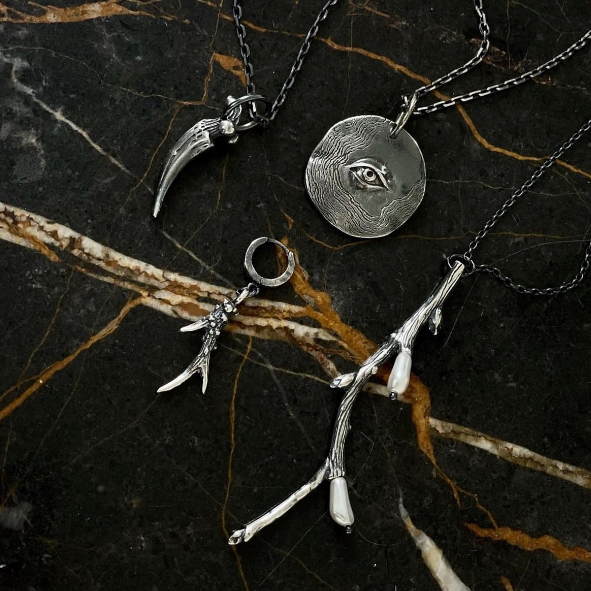 HORN EARRING - Macabre Gadgets Store