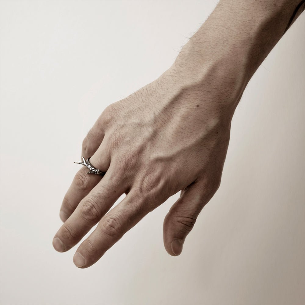 Horn ring on a man's hand, to show general dimensions and fit