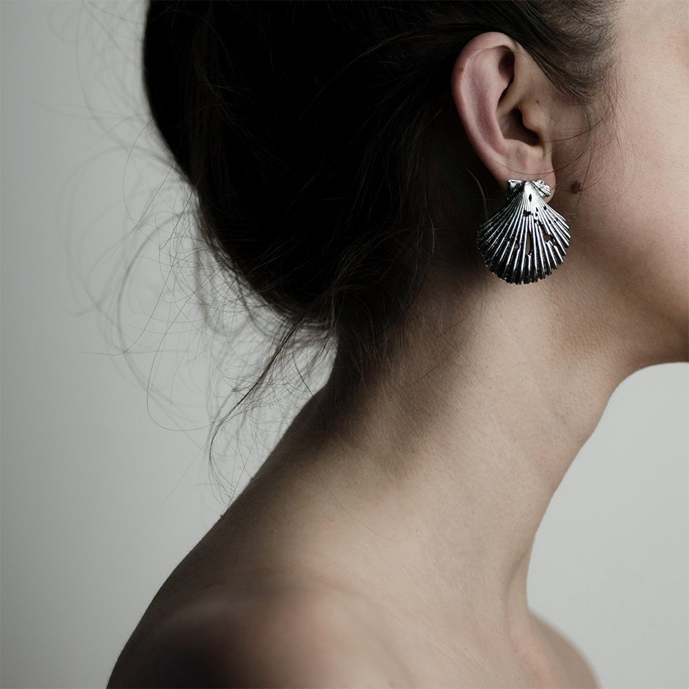 Female model wearing Large Seashell stud earring - large sterling silver stud earring, close-up shot