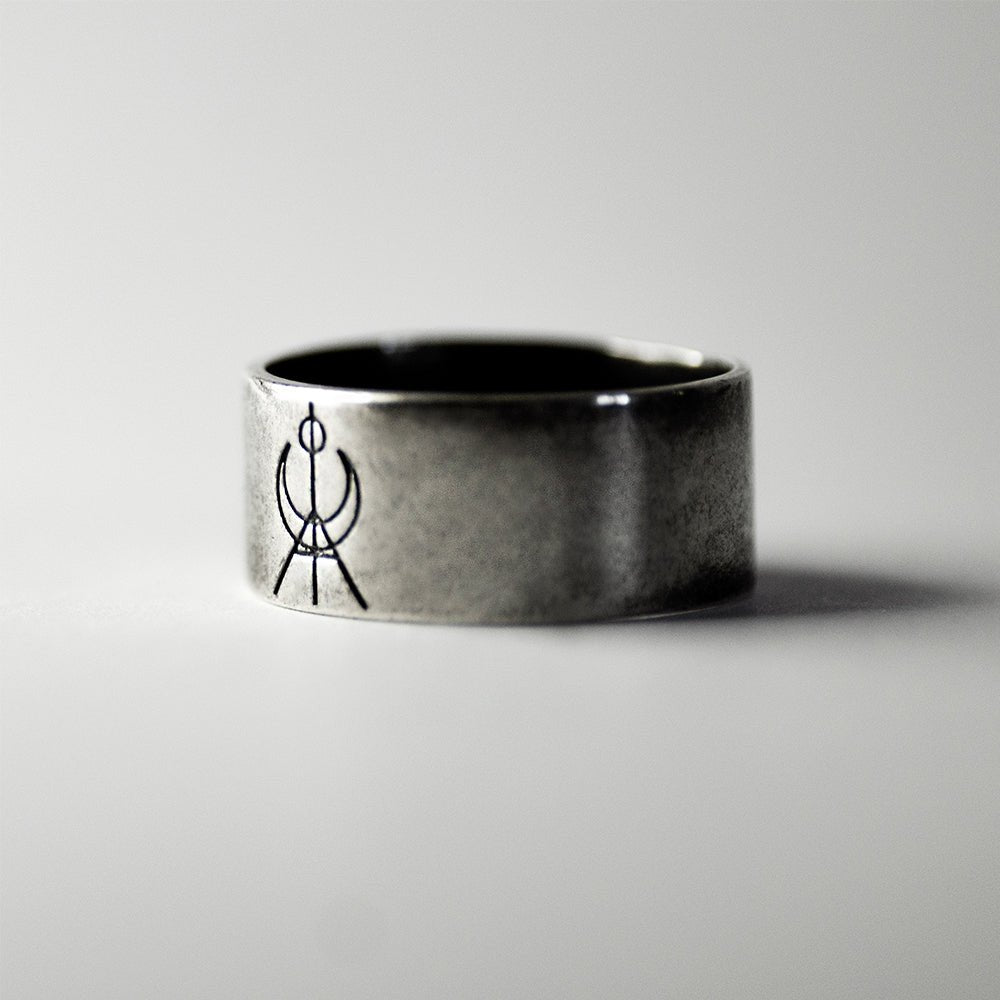MG Logo ring - wide sterling silver band-ring with geometric emblem in the centre 