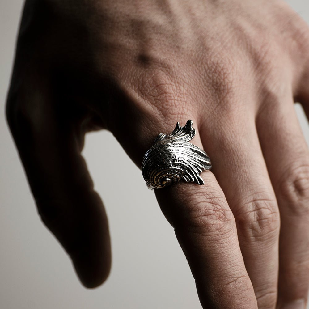 Model wearing Silver Seashell ring on index finger - mermaid core jewelry styling shot
