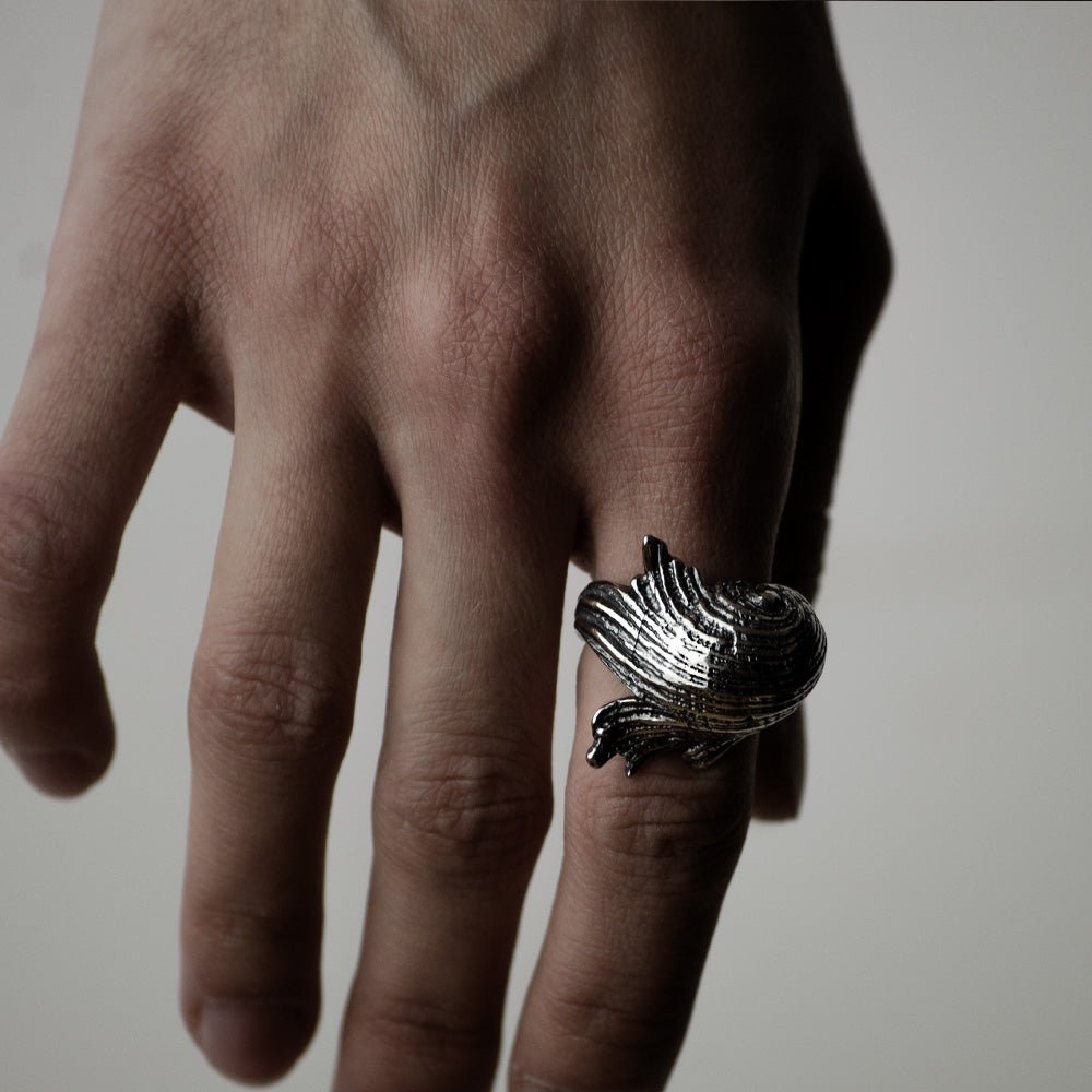 Female model wearing Silver Seashell ring - gothic mermaid inspired jewelry styling shot