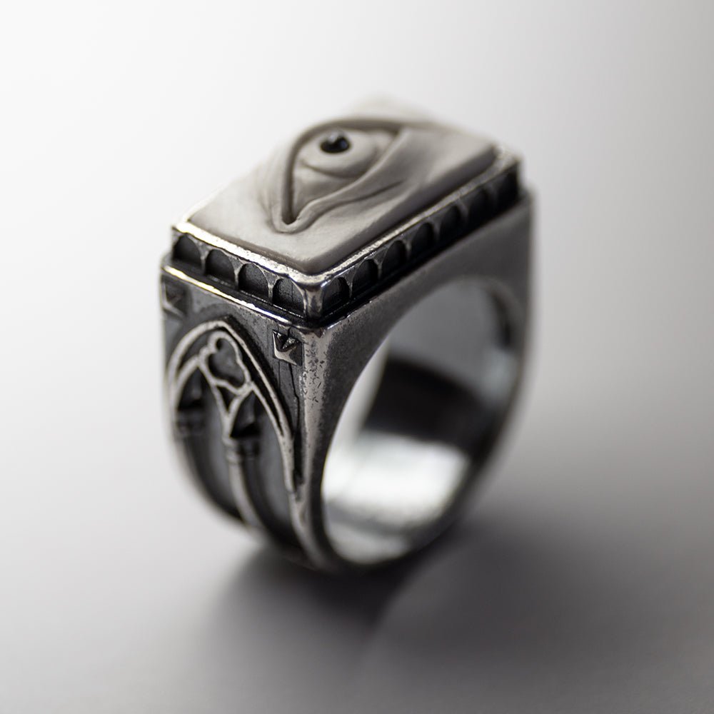 Oracle Gothic Eye Ring - on a white surface, eye element and gothic architecture decoration are visible