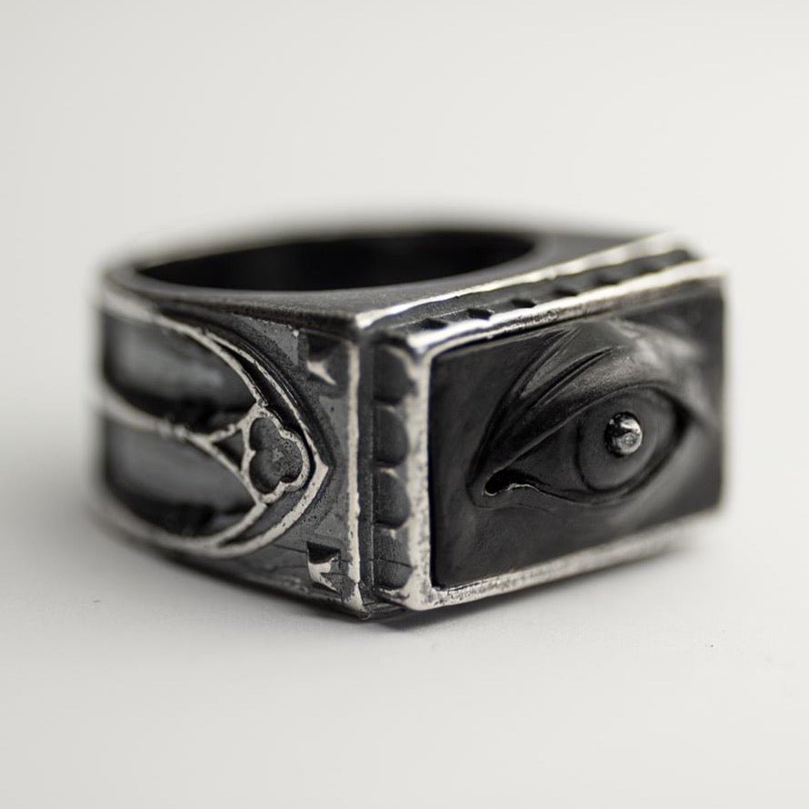 Oracle Gothic Eye Ring - black variant - semi side view on a white surface