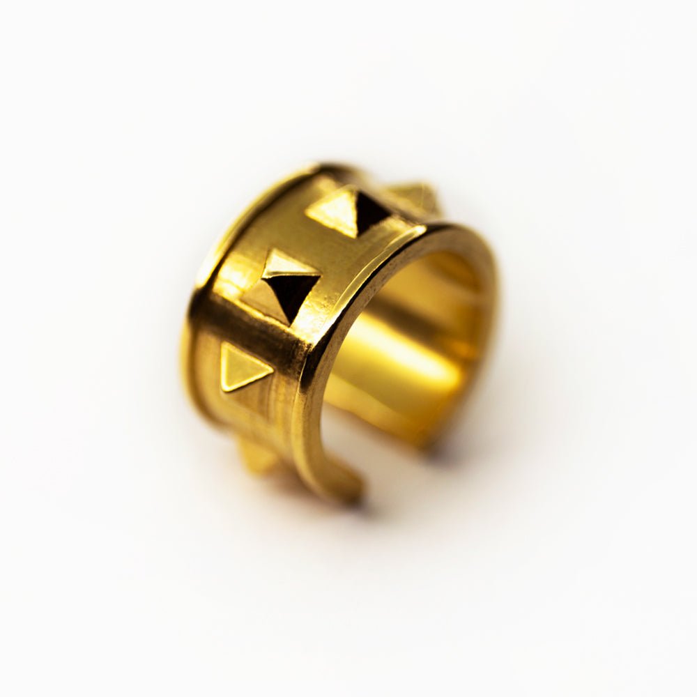 Wide studs ear cuff - chunky ear cuff with studs in gold-plated finish on white background
