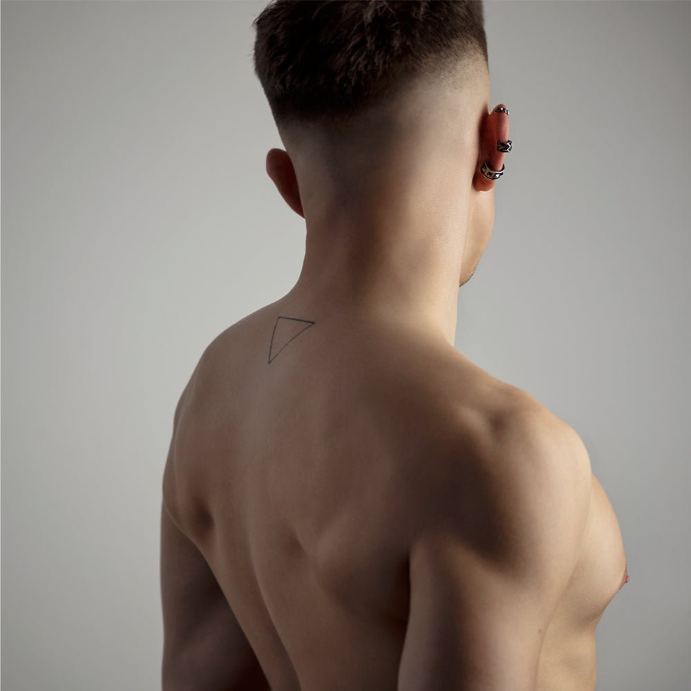 Male model wearing Wide studs ear cuff - chunky gothic ear cuff