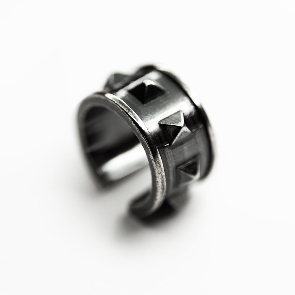 Wide studs ear cuff - chunky sterling silver ear cuff with studs on white surface