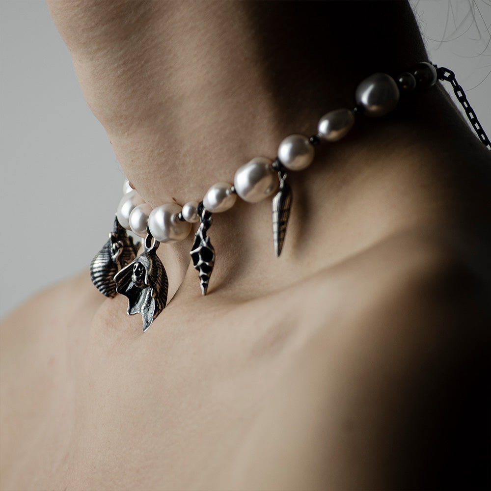 Silver Shells and Pearls choker on a female model, close up, side view