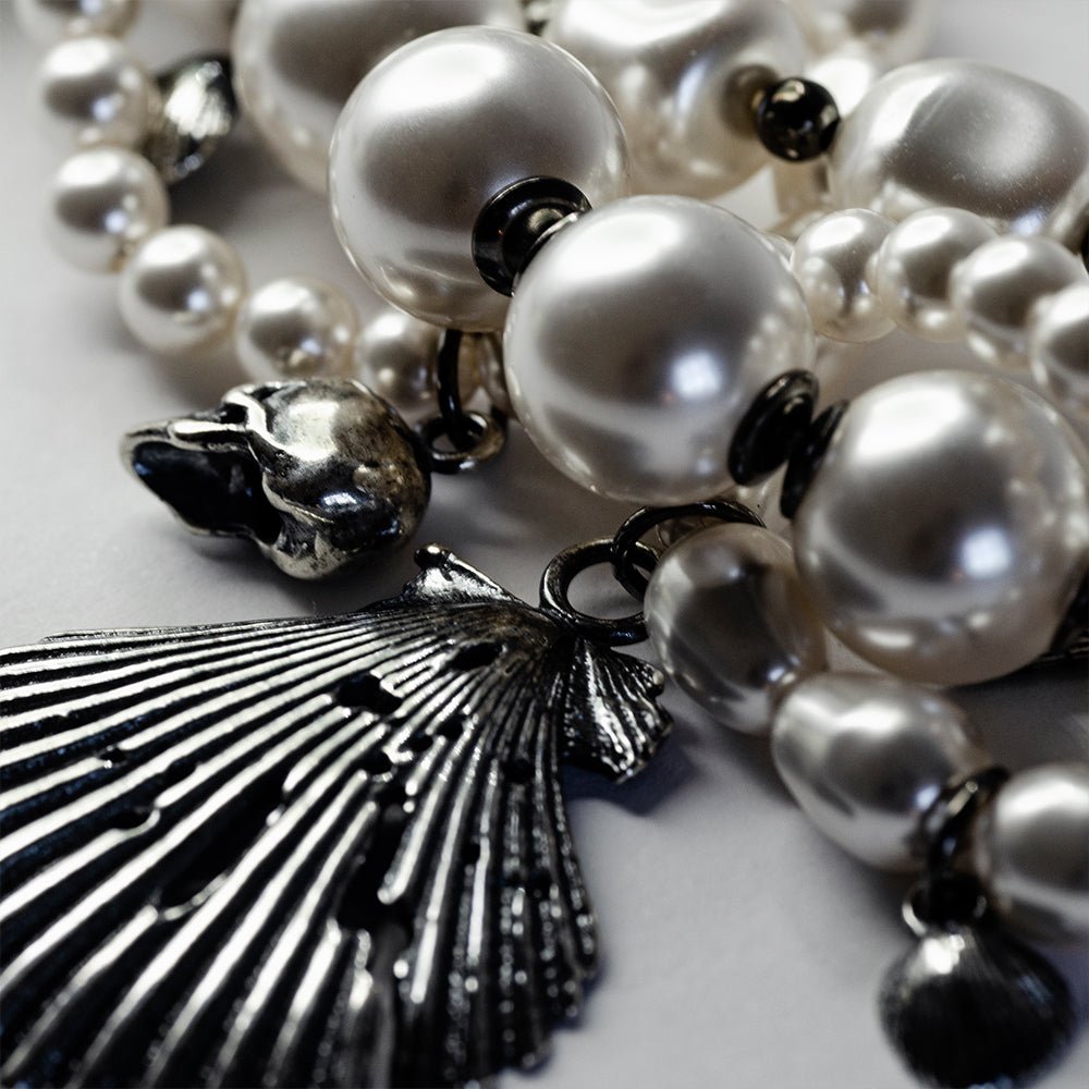 Siren Pearl Necklace - close up of a large silver shell, necklace's centrepiece, large pearls are also visible