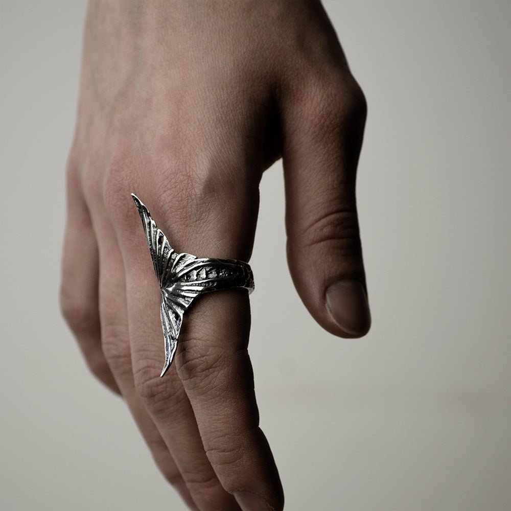 Siren ring on model's hand to show the fit of silver mermaid tail ring