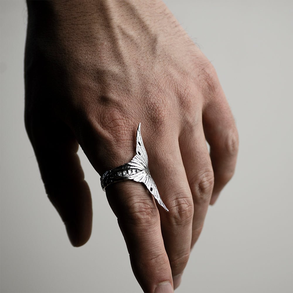 Siren ring on model's hand to demonstrate  fit and size