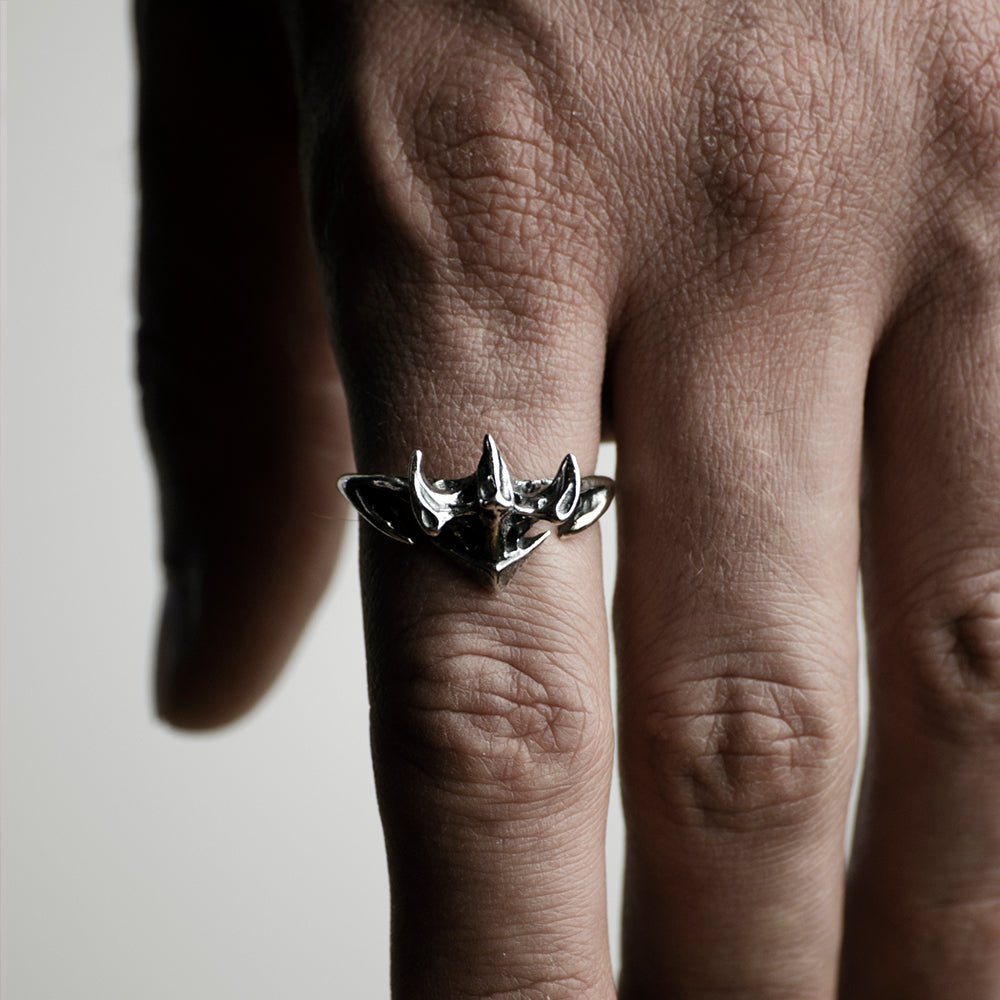 Vertebra ring on a model's hand - gothic ring styling shot